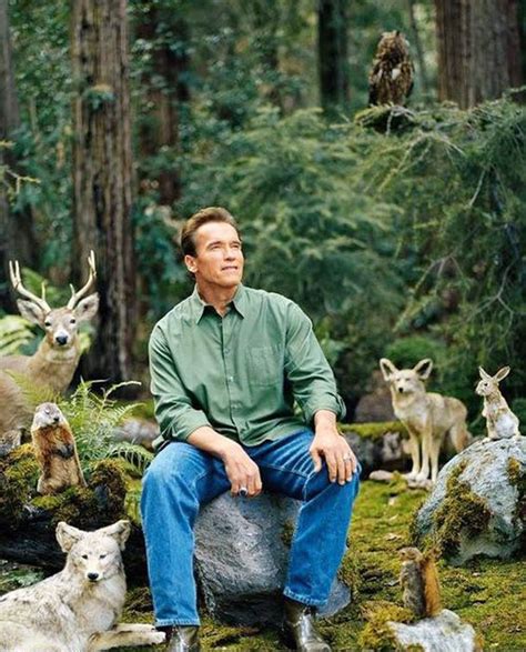 arnold schwarzenegger sitting in nature